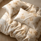 Aurelia champagne duvet cover set with golden floral jacquard
