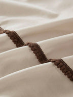 Livia Beige Duvet Cover Set with brown pom-pom trim