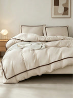Livia Beige Duvet Cover Set with brown pom-pom trim