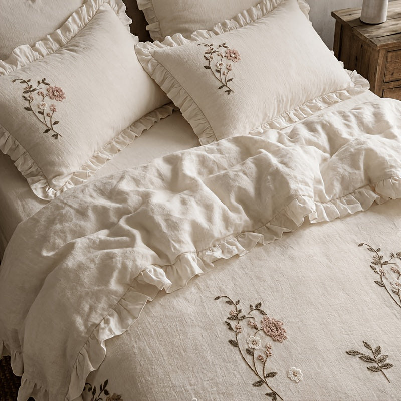 Fiorella beige duvet cover set with floral embroidery and ruffled hems