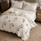 Fiorella beige duvet cover set with floral embroidery and ruffled hems