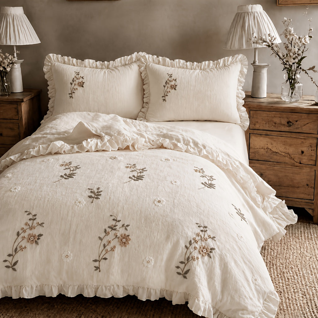 Fiorella beige duvet cover set with floral embroidery and ruffled hems