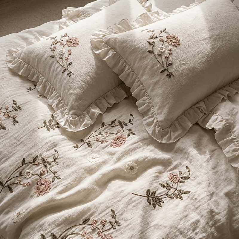 Fiorella beige duvet cover set with floral embroidery and ruffled hems